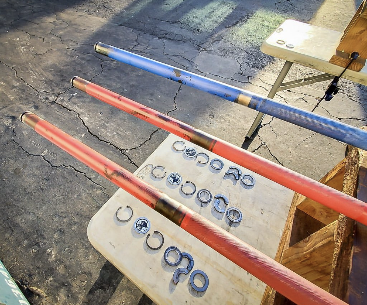 Gym maintenance on barbells at a gym in Los Angeles