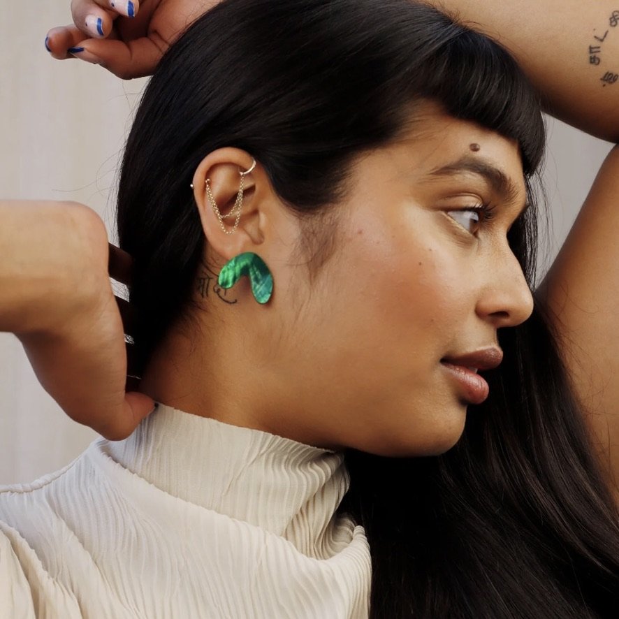 Cassia Emerald Studs on model R.jpeg