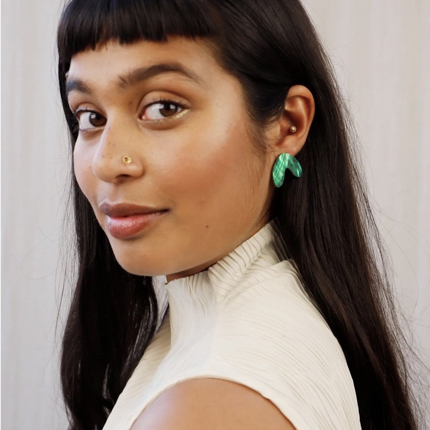 Cassia Emerald Studs on model.jpeg