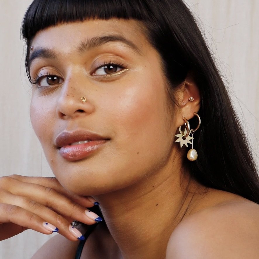 Kara Interchangeable Charm Hoops Emerald on model L.jpeg