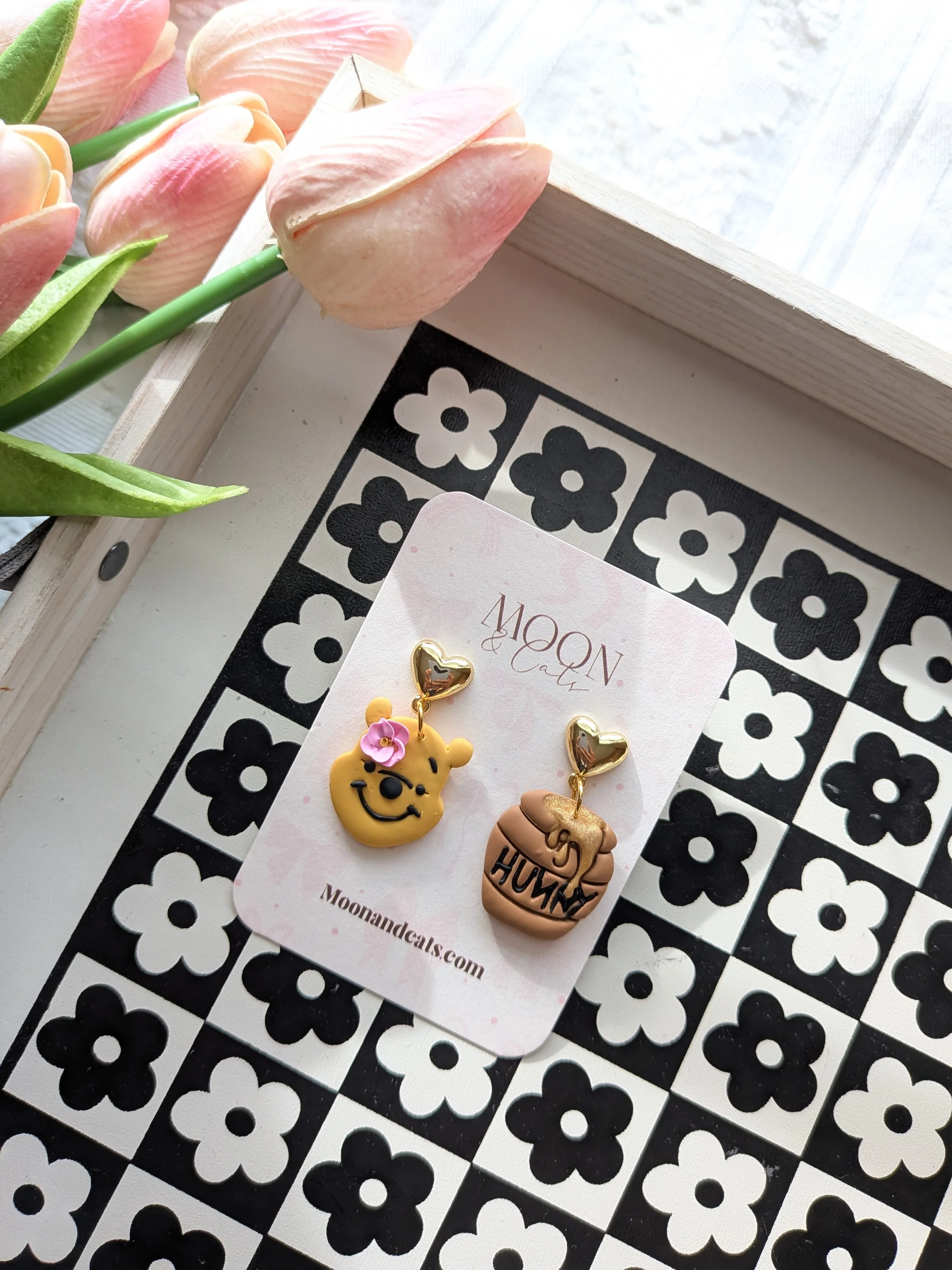 Poo bear mismatch earrings