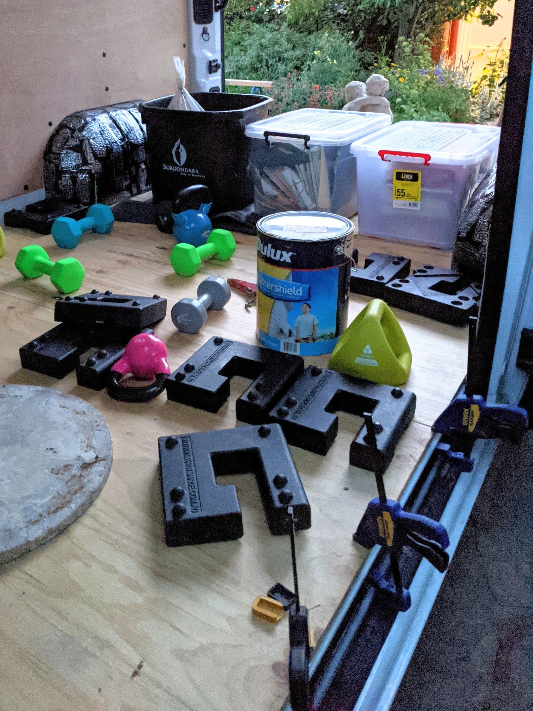 A variety of heavy items weighing down subfloor in van