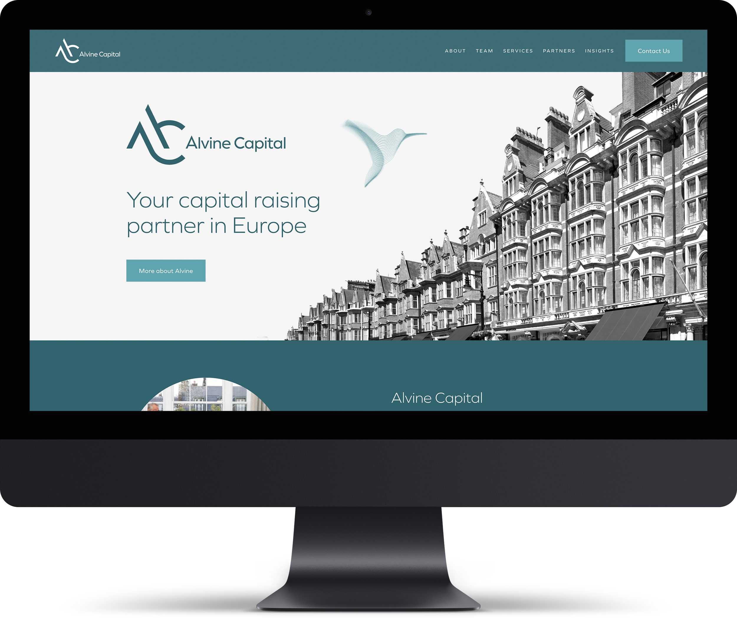 Computer monitor displaying a website for Alvine Capital, a European capital raising firm, with a cityscape of historic European buildings in the background.