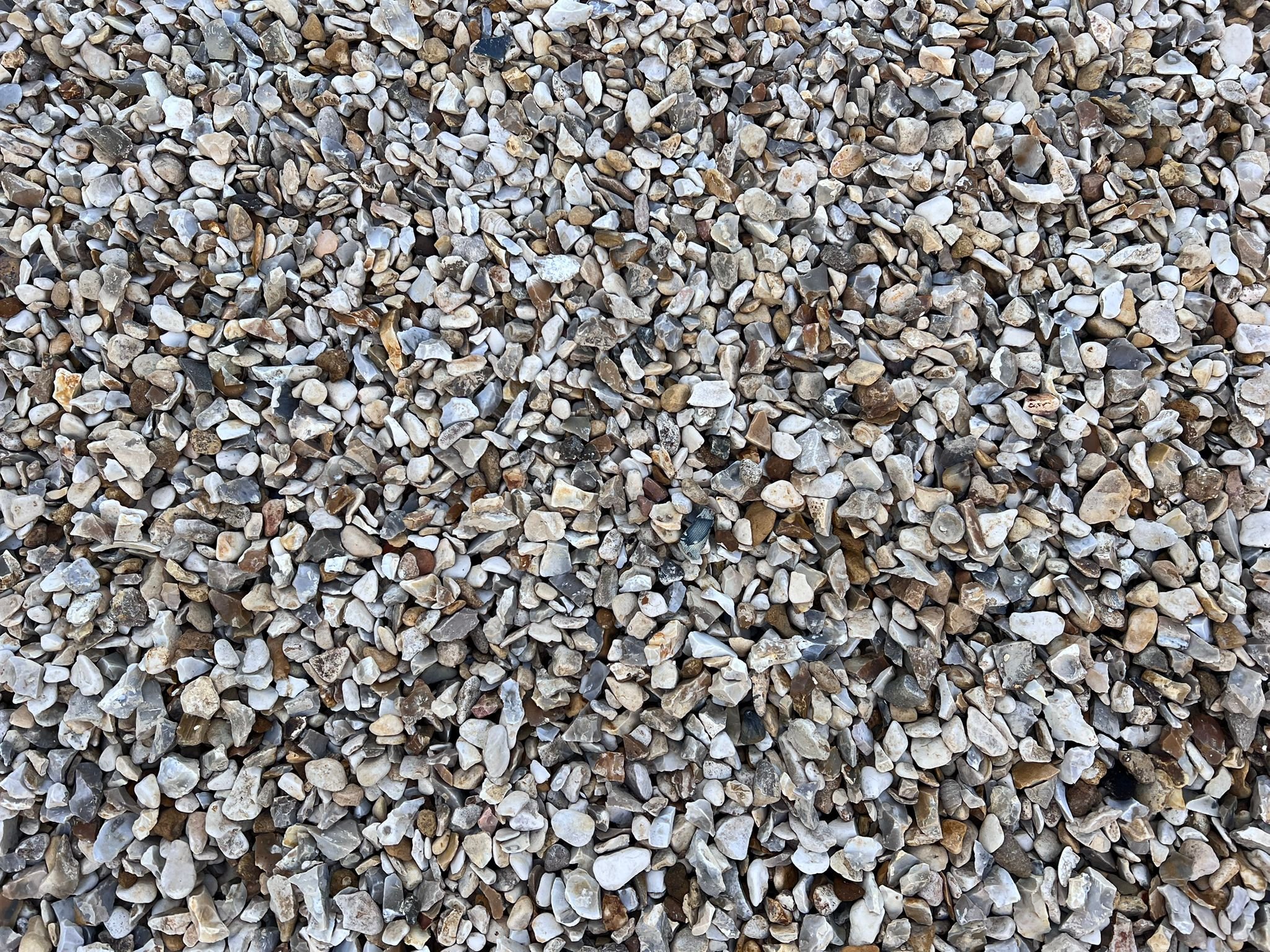 Close-up view of small, multicolored gravel stones.