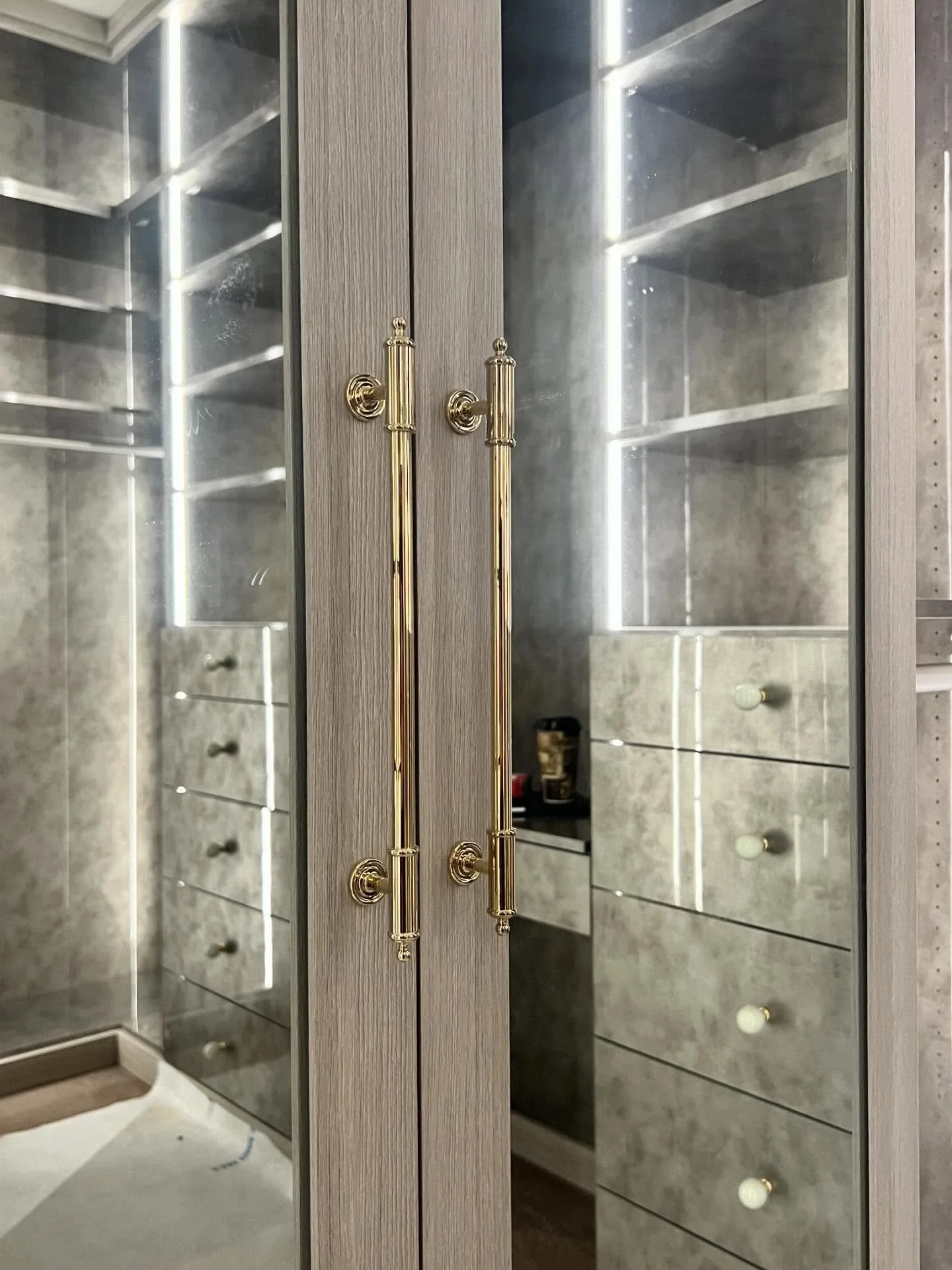 Master Hers. Never use boring closet hardware.