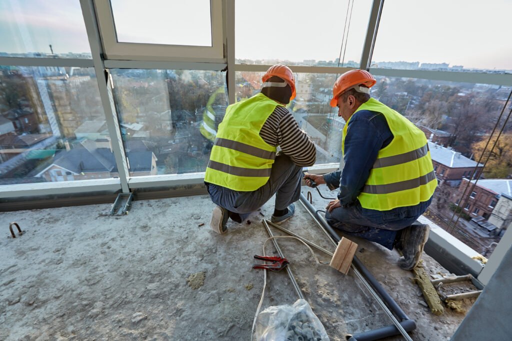 Taras-Building-Restoration-installing-plastic-pipes-using-soldering-iron-on-balcony-of-flat-of-building-under-construction-1024x683.jpeg