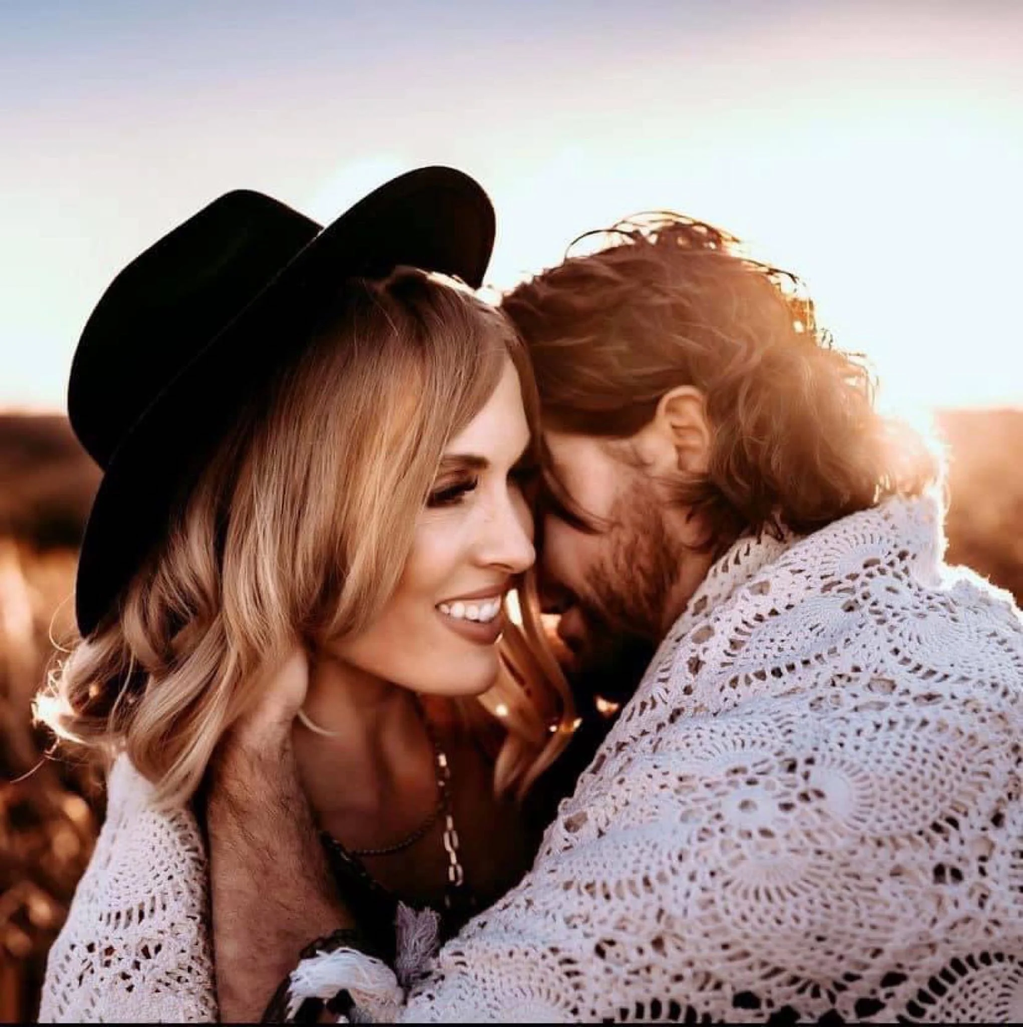 couple embracing each other sunset photoshoot