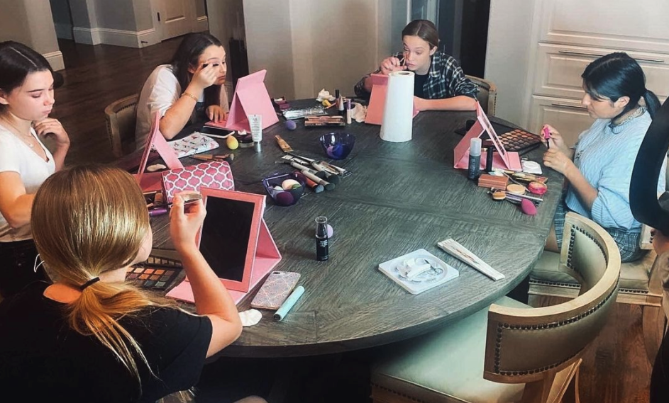 teenagers applying makeup