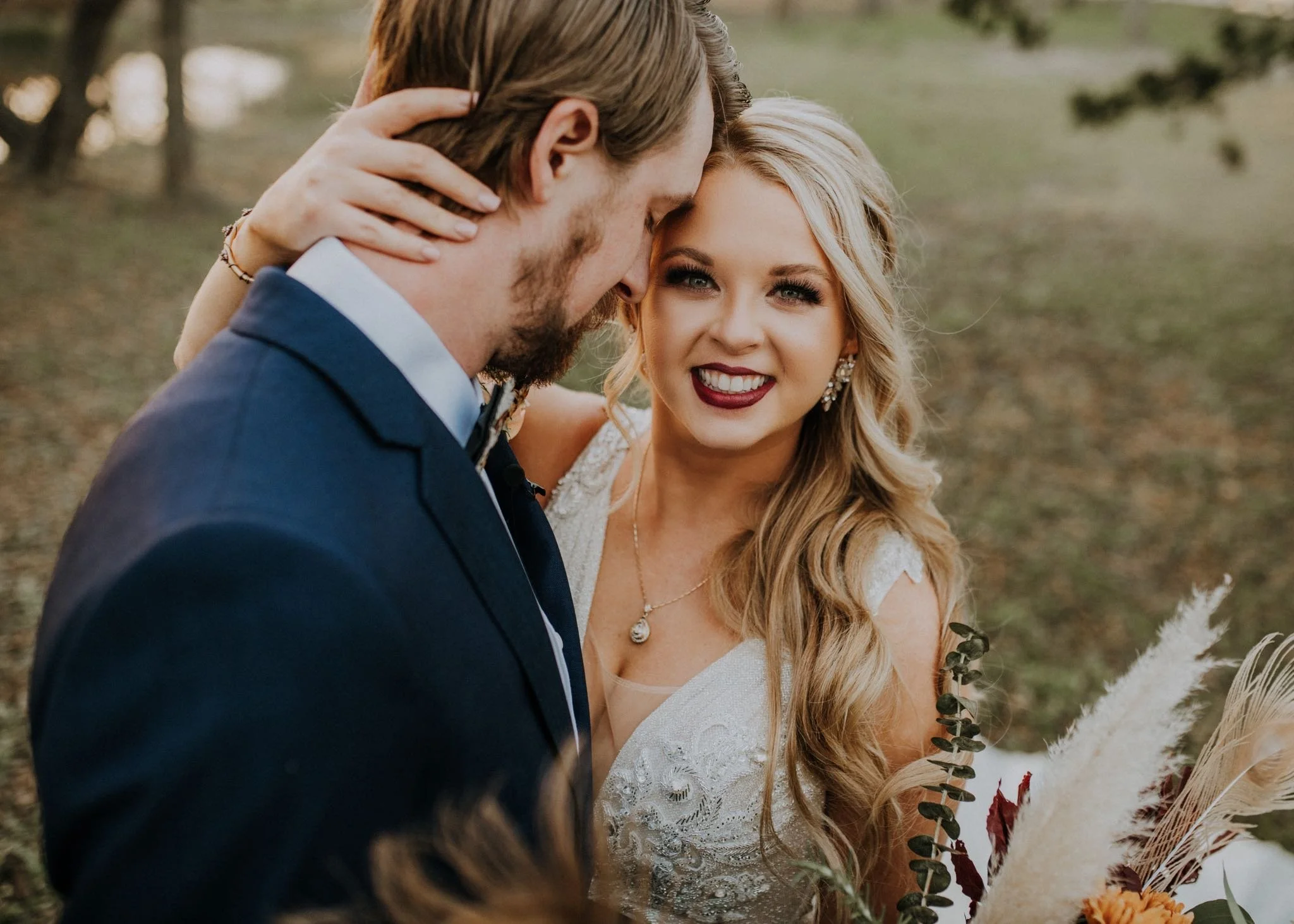 bride hugging husband