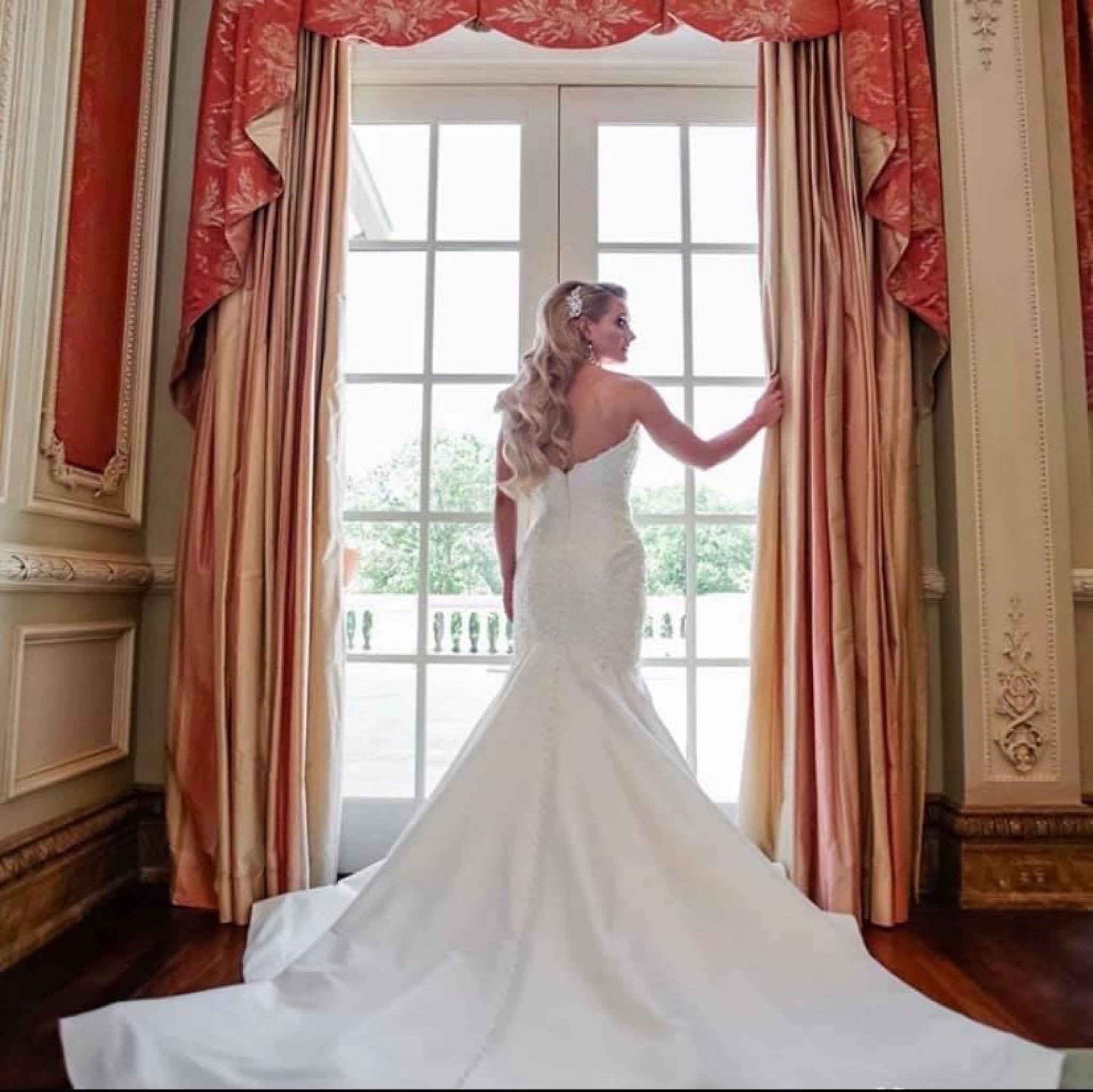 bride looking through the window