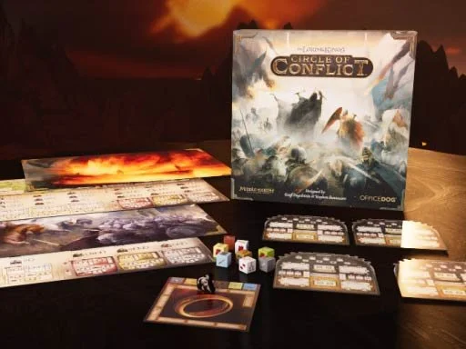 Table with the game "Circle of Conflict," game boards, character tokens, dice, and cards set up for gameplay.