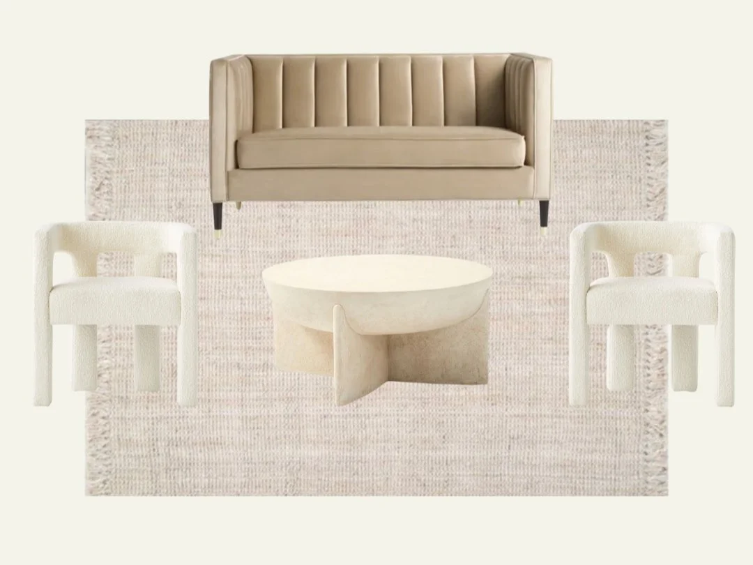 Modern furniture arrangement: tan sofa, two white armchairs, round coffee table, and beige woven rug.