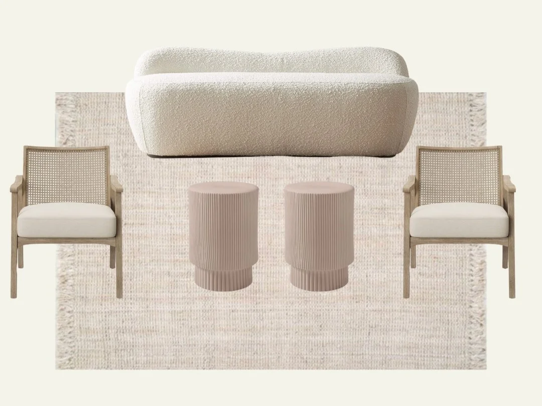 Modern living room furniture set with white curved sofa, two beige side tables, two beige armchairs, and a textured light-colored area rug.