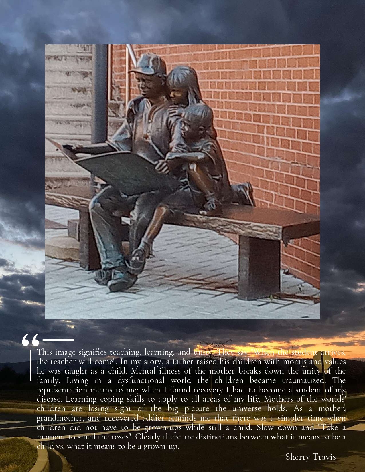 A bronze statue of a woman reading a book to two children, seated on a wooden bench against a brick wall.