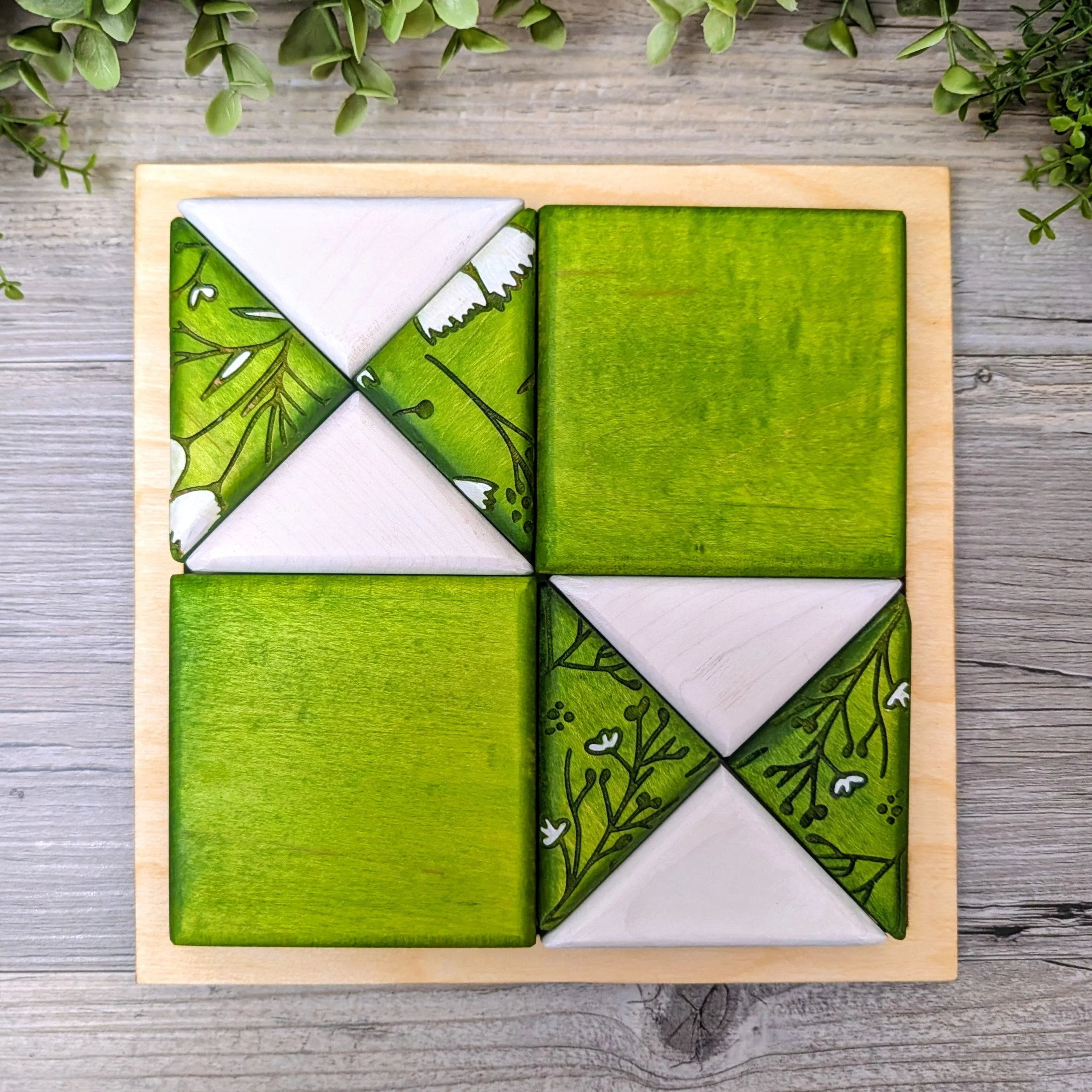 Spring Green Puzzle B made from green and white geometric wooden blocks