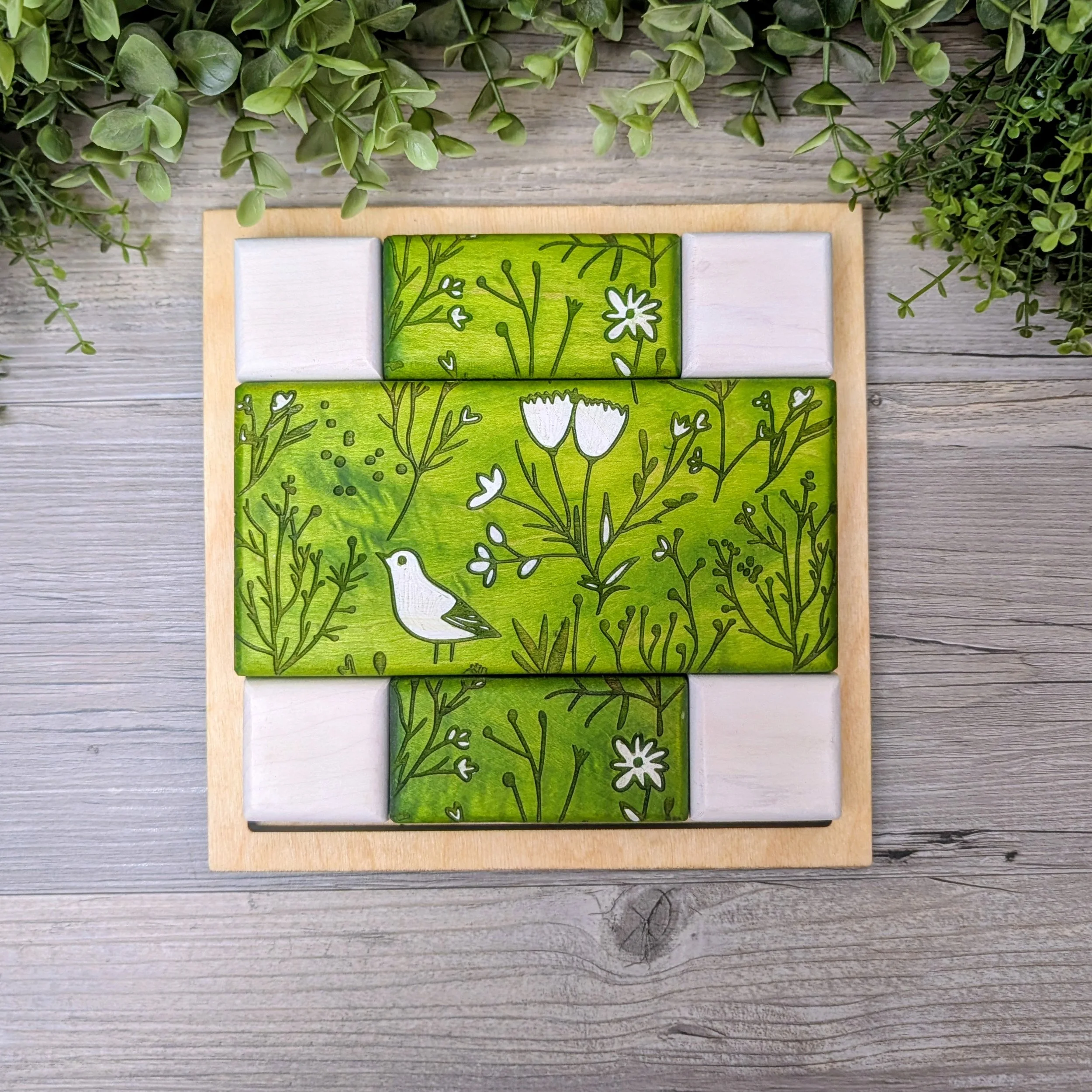 Spring Green Puzzle C made from green and white geometric wooden blocks