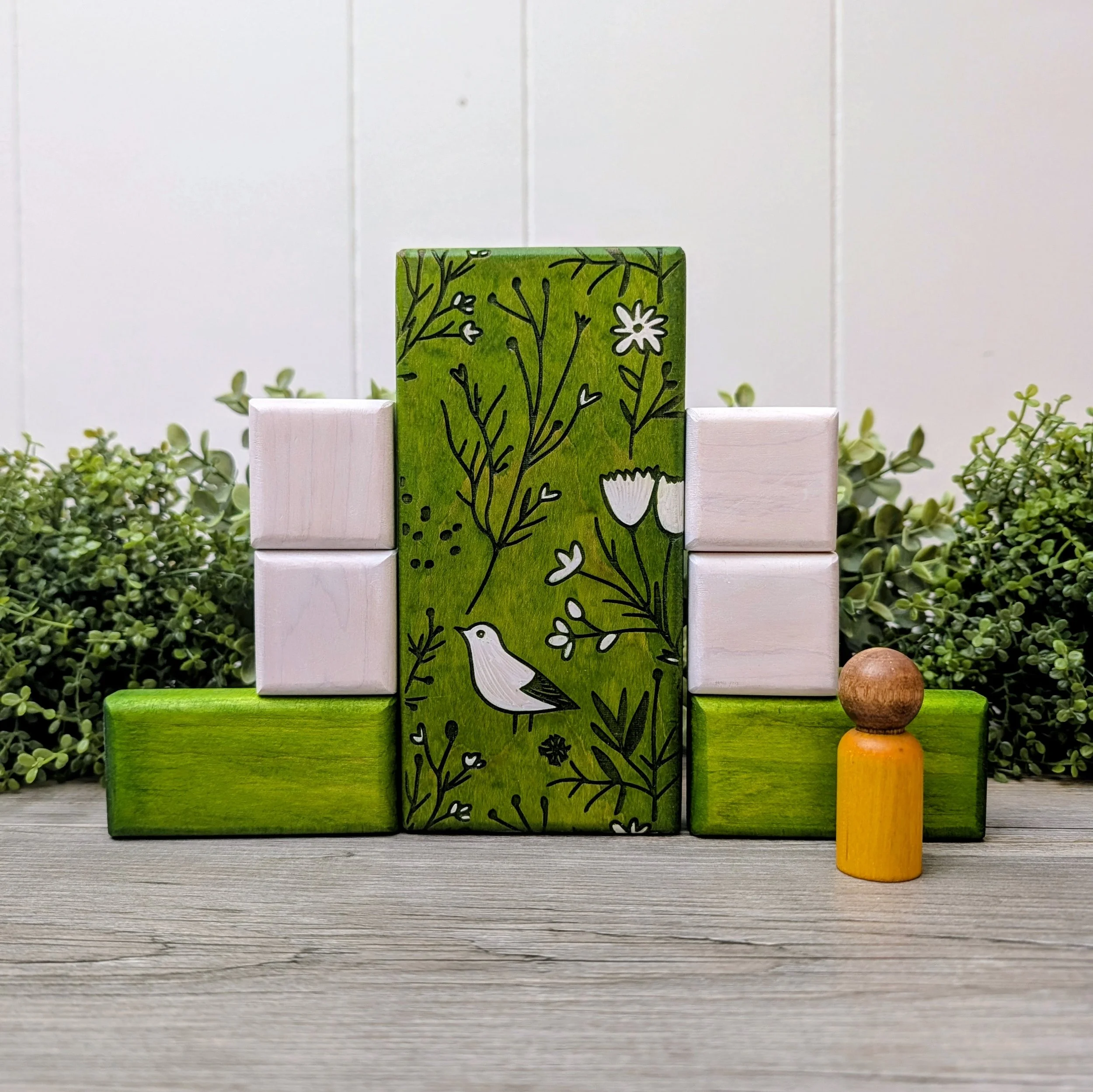 Handmade geometric wooden puzzle with larger patterned blocks