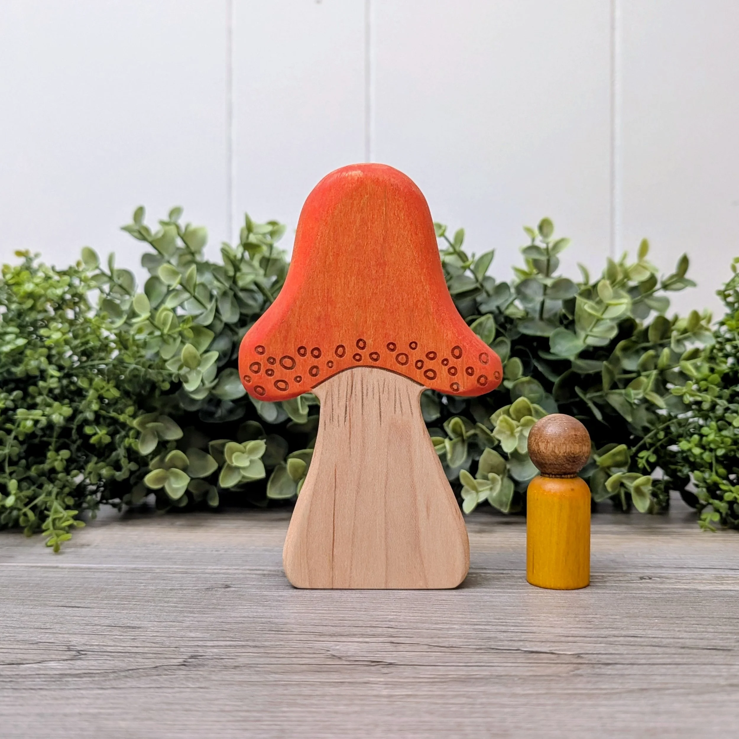 Orange stained wooden mushroom play tree for small world play