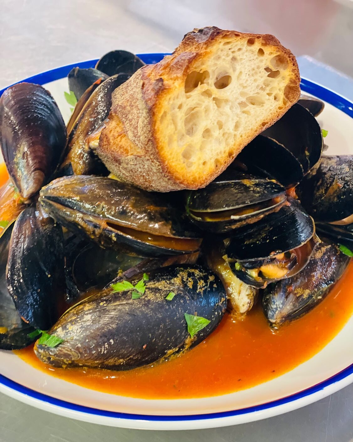 Steamed @springbaymussels with tomato and saffron