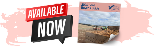 An image of a seed buyer's guide magazine titled '2026 Seed Buyer's Guide' next to a sign reading 'Available Now' in red and black, with a farm scene in the background.