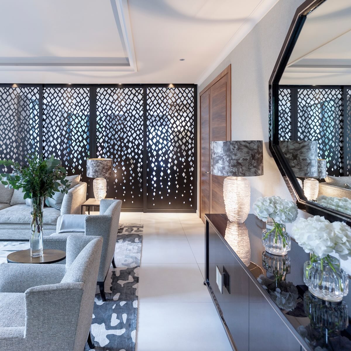 Revisting a project we completed 8 years ago, and these bespoke bronze metal screens still feel as striking and relevant as the day they were installed.
Designed as a flexible divider between the main lounge and kitchen, the screens gave our clients 
