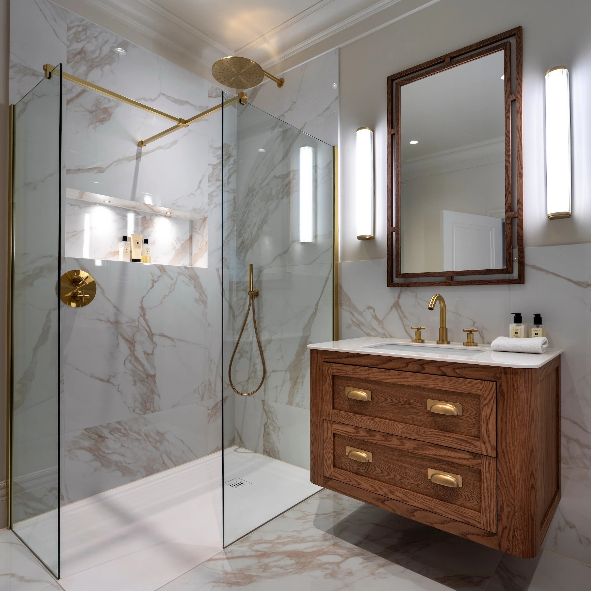A Bathroom should be the one room in the home where the pace slows, the door closes, and the day quietly falls away.

For this family bathroom, we wanted to create a space that felt more like a private spa than a traditional bathroom. Warm oak cabine
