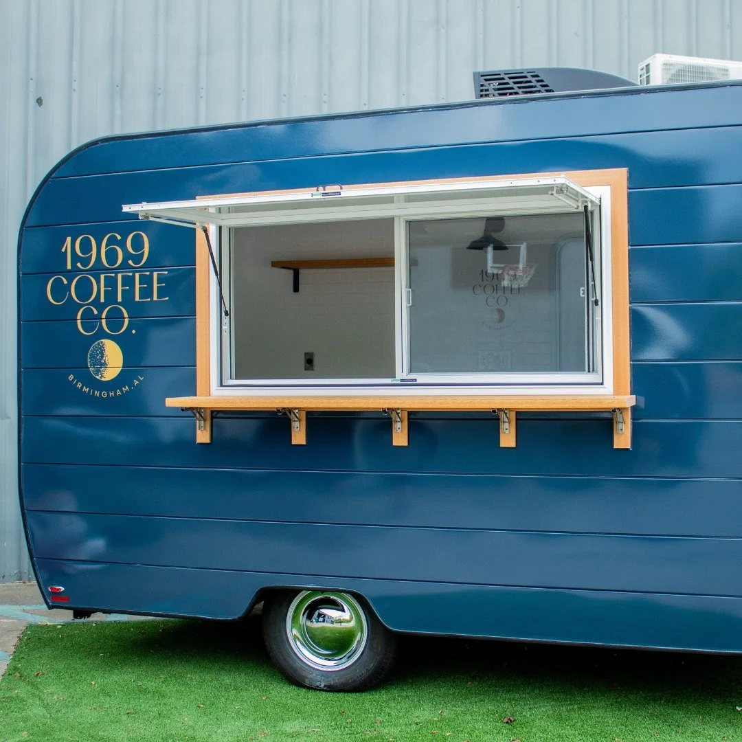 Our exterior composite wood-esque trim comes in two variations - white oak and walnut! The white is is featured on the blue trailer and the walnut is featured on the black. This means you get a wooden "look", but don't have to refinish and 