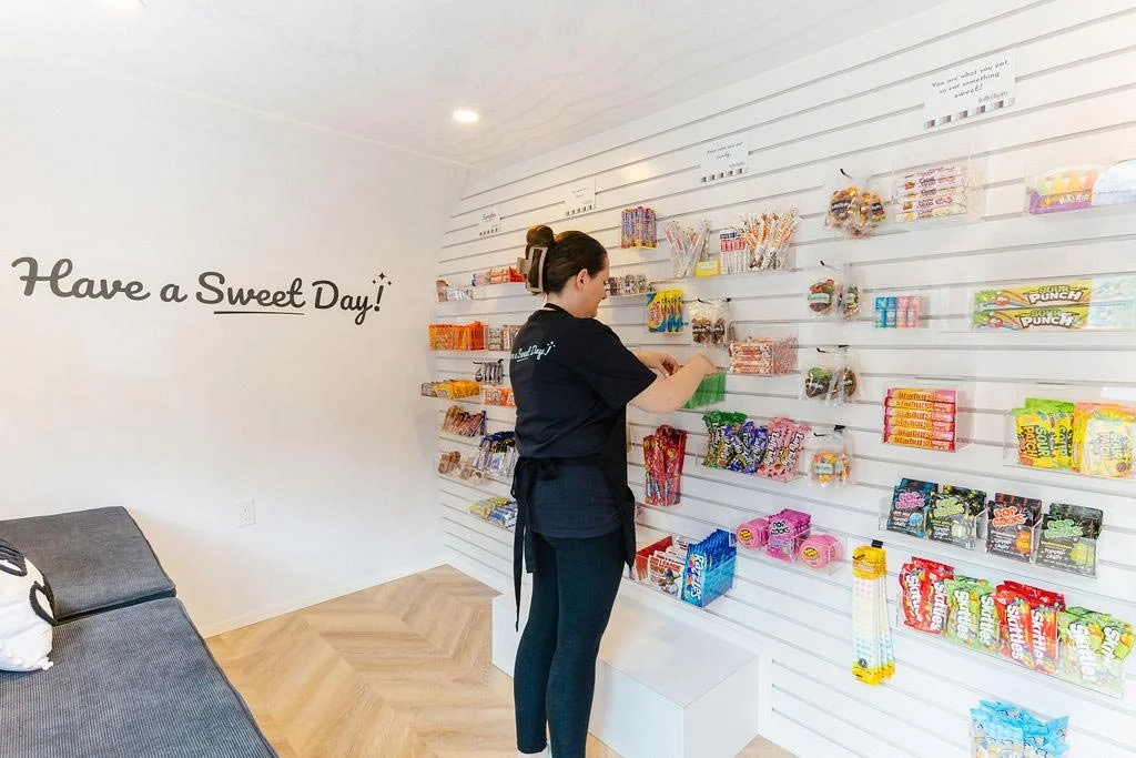 aero-build-mobile-food-trailers-client-candy-shop-interior-pose-lolly-dippity.jpg