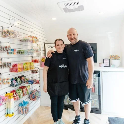 Lolly Dippity owners with their Aero Build candy shop trailer
