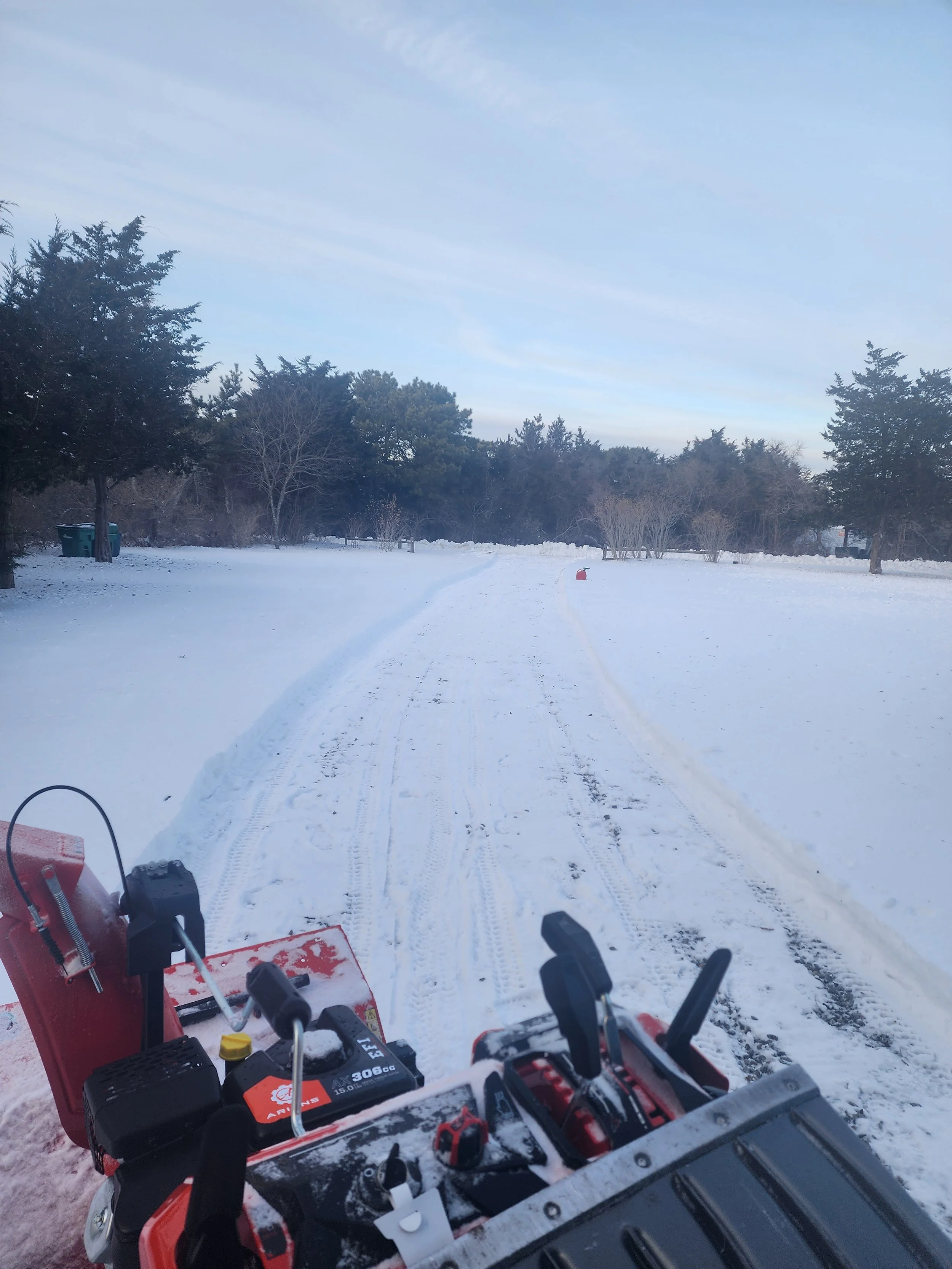 Residential driveway snow blowing service after storm on Martha’s Vineyard by West Wind MV.