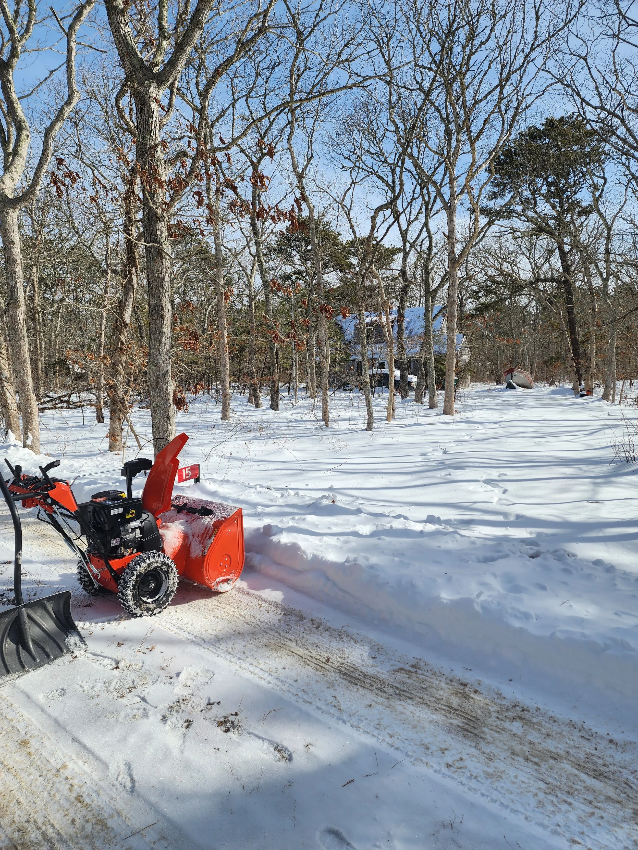 Residential snow removal for driveways using snowblower and shoveling on Martha’s Vineyard by West Wind MV.