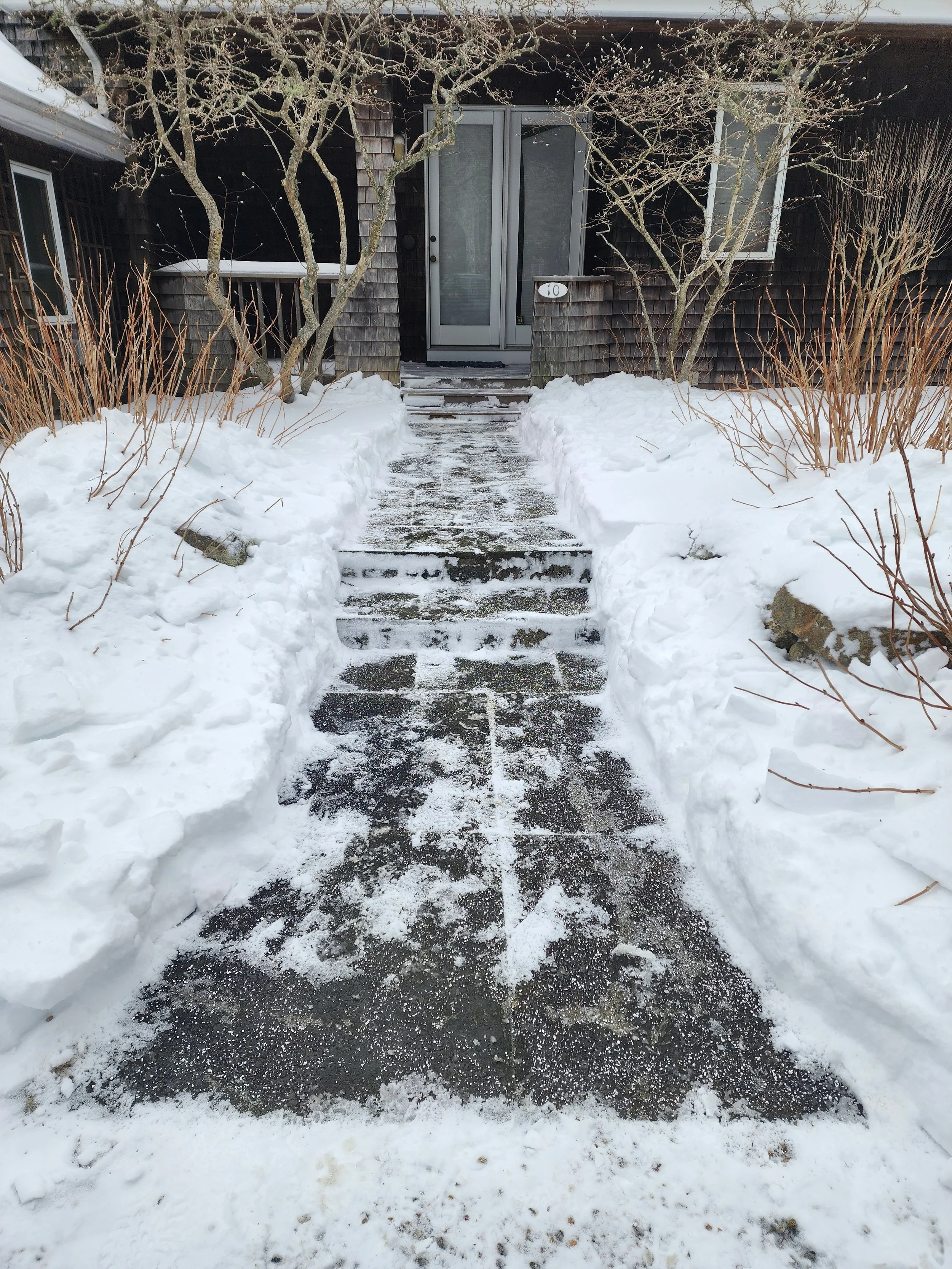 Residential walkway snow shoveling and ice control on Martha’s Vineyard by West Wind MV.