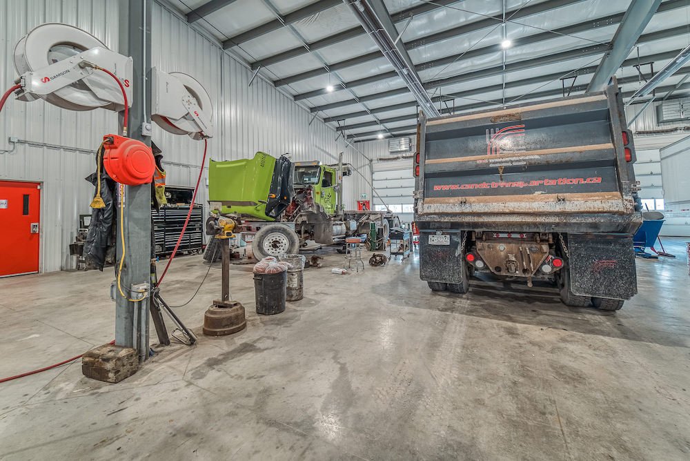 Dump truck maintenance in the C&amp;C truck service centre in Vars, Ottawa