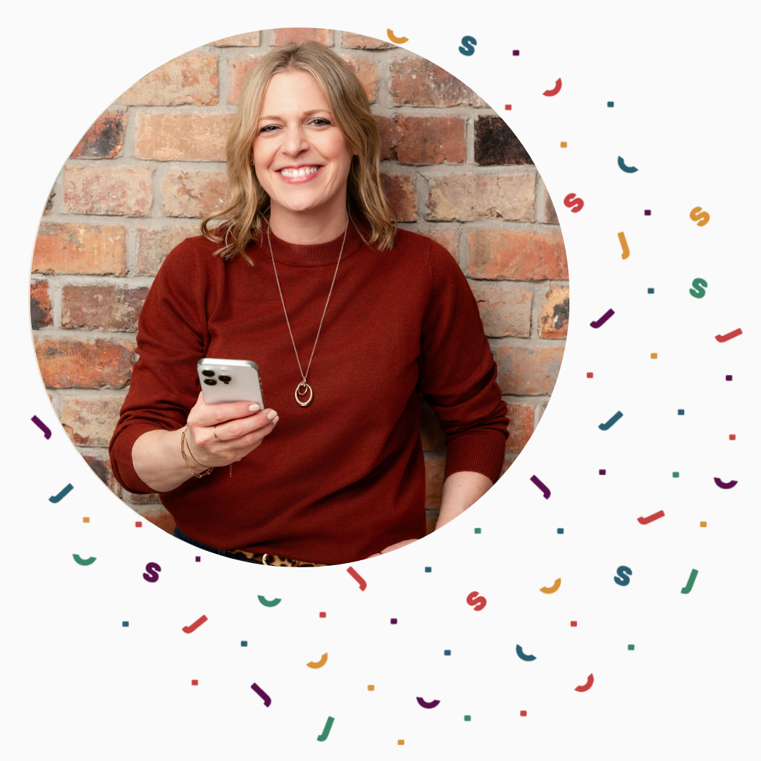 Close up of social media strategist Sarah Pascaru holding a mobile phone