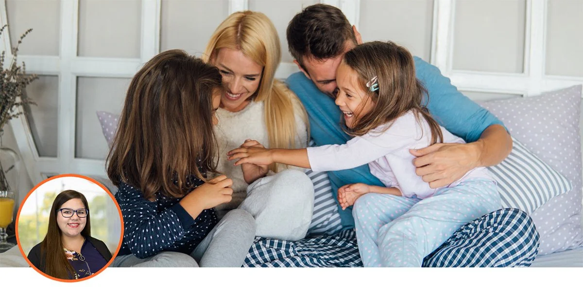 Photo of family connecting and loving on each other.