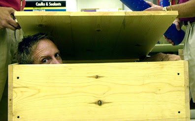  Michael Griffin, an escape artist that will be performing at the Allen County Fair, tries out a box that he will be challenged to escape from Saturday evening. The box was built by Lima Lumber and they have brought forth the 10,000 dollar challenge.
