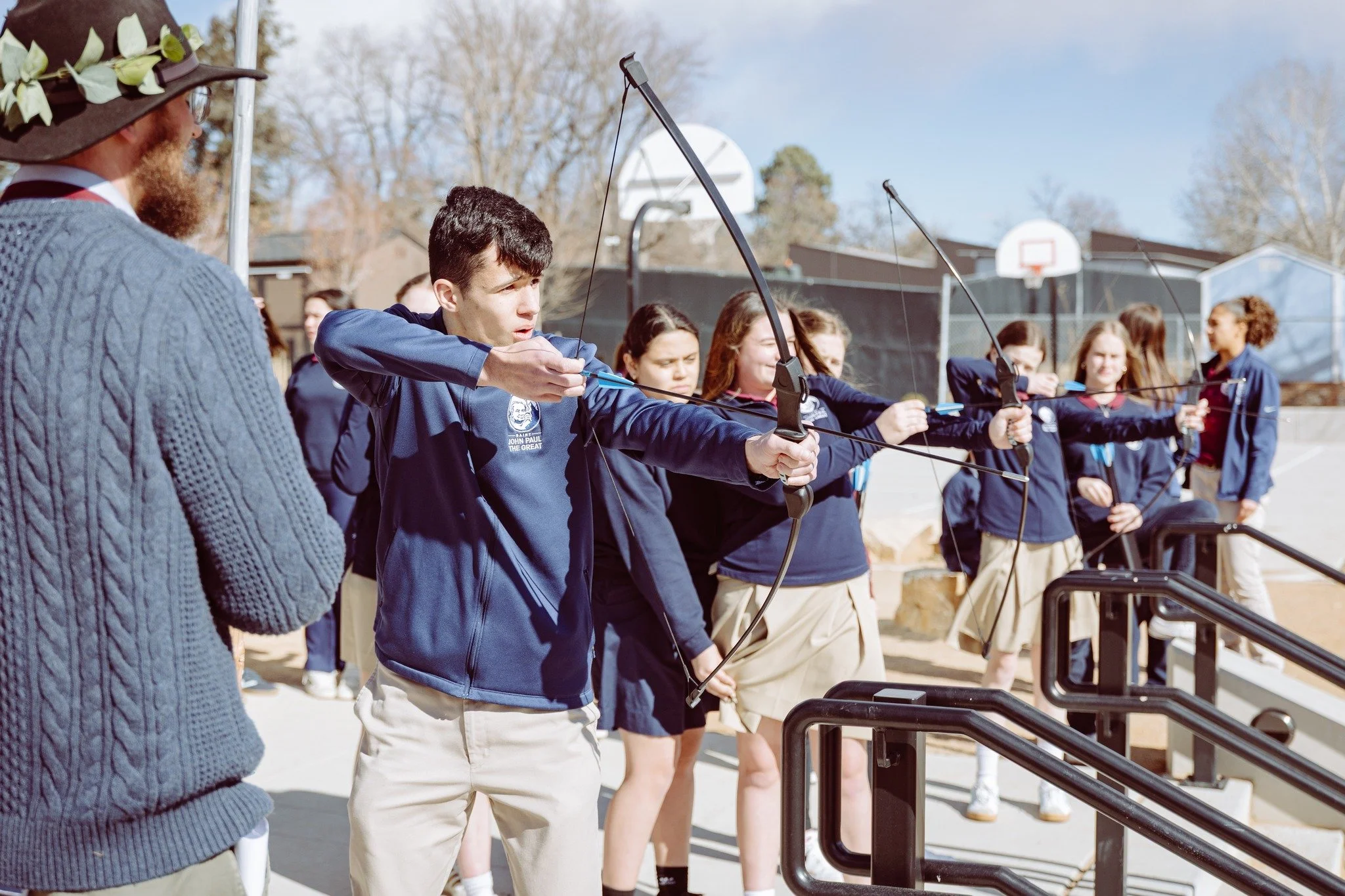 Freshmen celebrated their Paideian Feast on Tuesday with a spirited day of competition, testing their wit, strength, and courage through trivia, foot races, archery, boxing, blind mazes, and the recitation of poetry. The festivities concluded in true