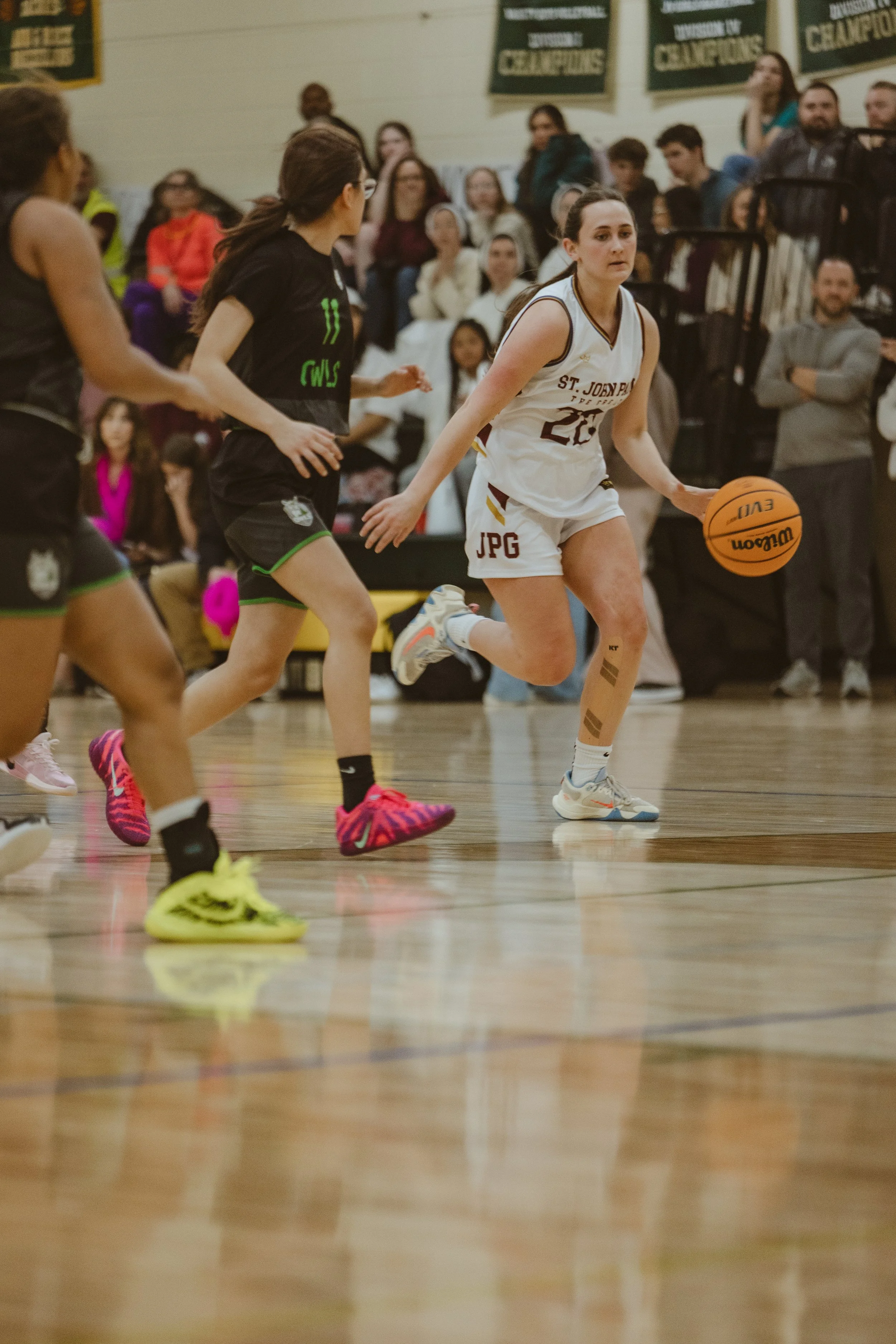 Athletes at St. John Paul the Great Catholic High school competing against other high schools around Denver