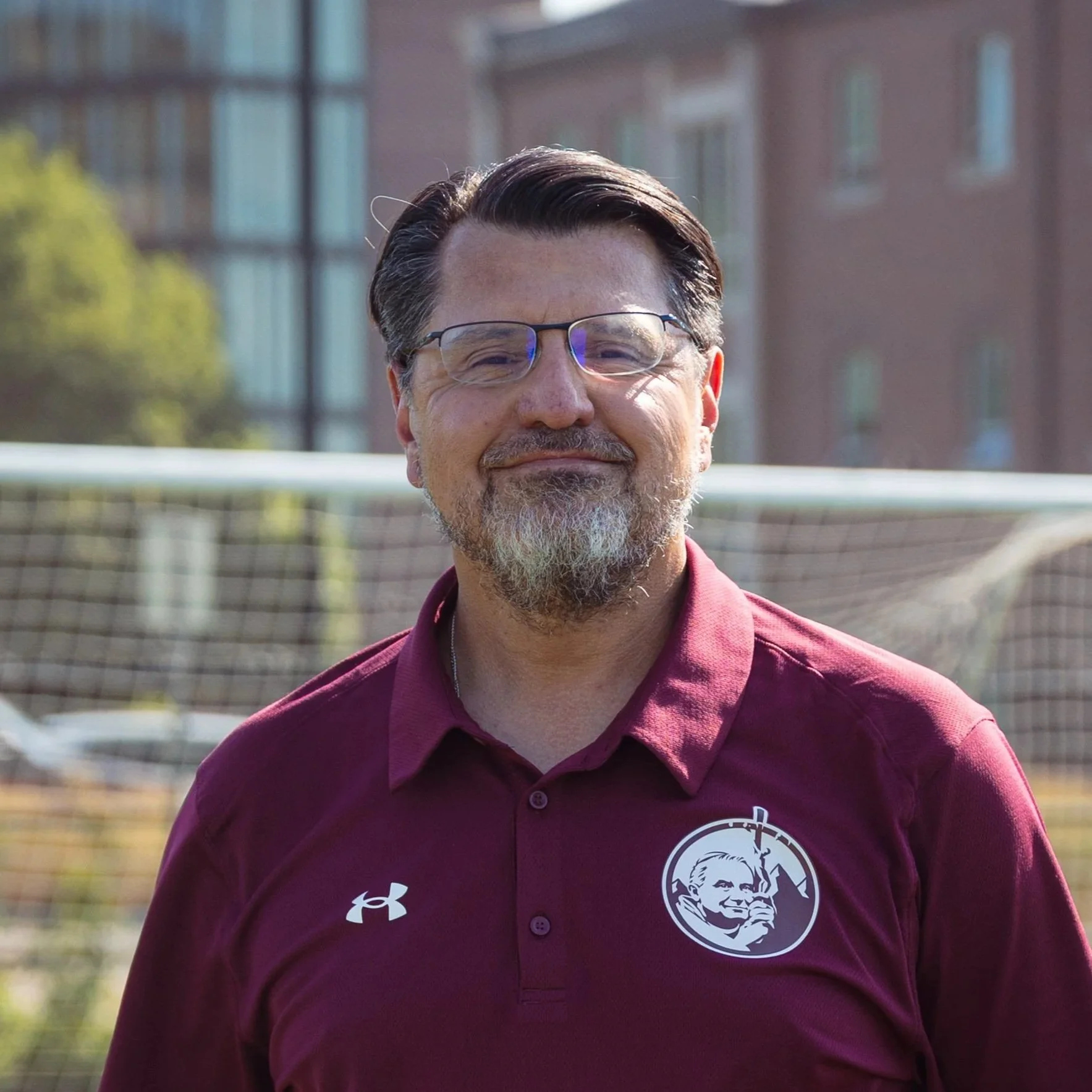 Denver private school athletics coach building strong team culture