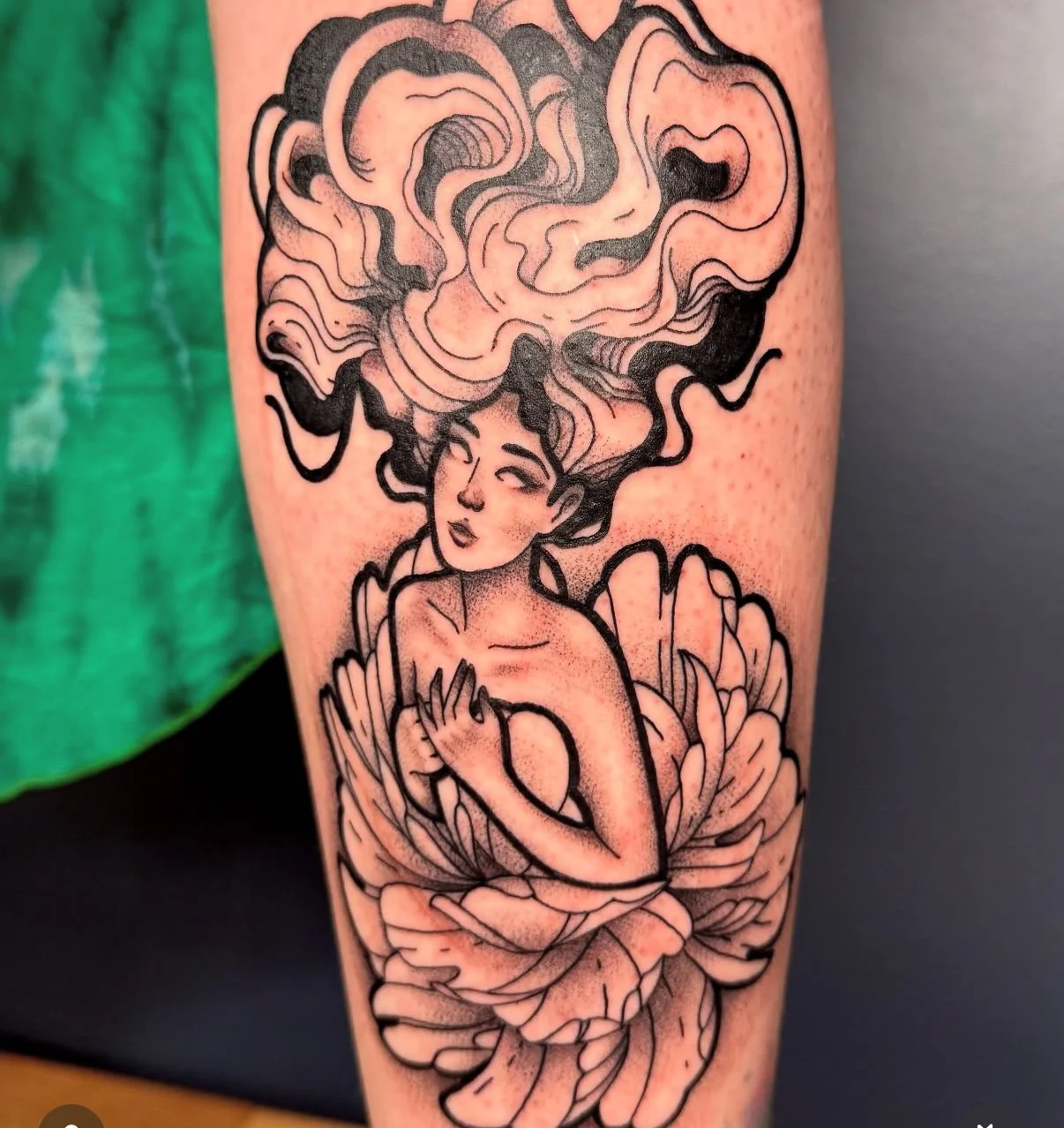 Royelle_tattoo Girl flowy hair in flower done in Calgary