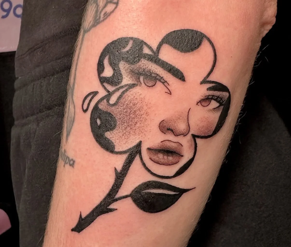 girl in flower design done by @royelle_tattoo in Calgary