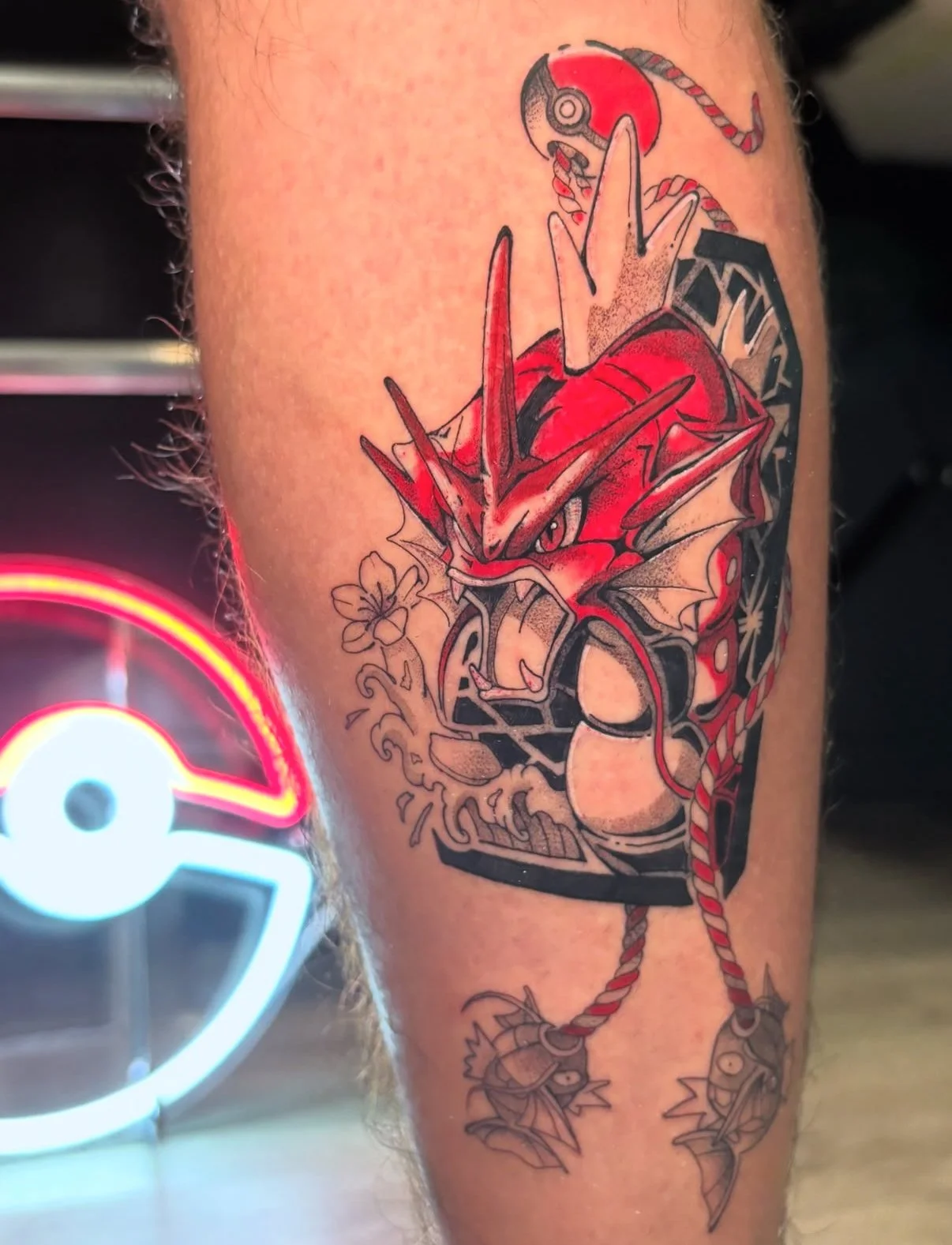 red garados tattoo design done by @just_mem_tattoo in Calgary