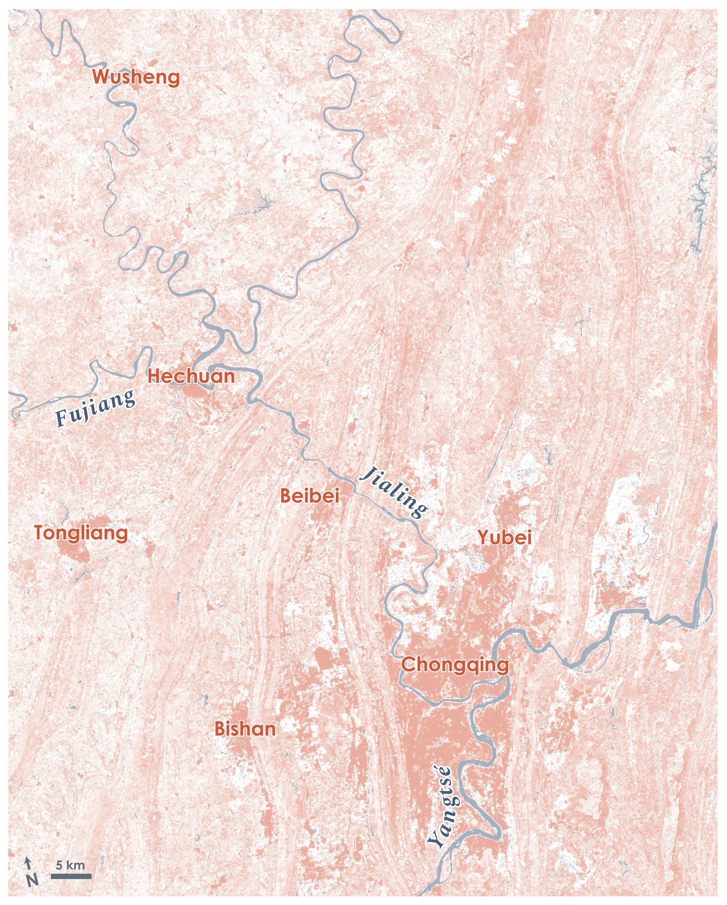 The huge city of Chongqin, China, on the banks of the Yangtze and surrounded by a rugged landscape with the Three Gorges Dam to its South  – Landsat 8 satellite composite.
Blue shows water. Orange shows cities and vegetation.
