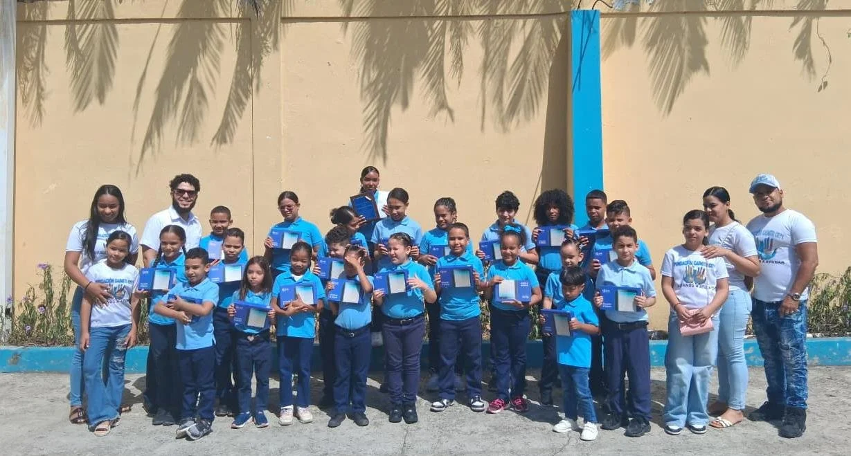 June 2026 - Donation of Tablets and Scholarship to Top Students in El Caimito
