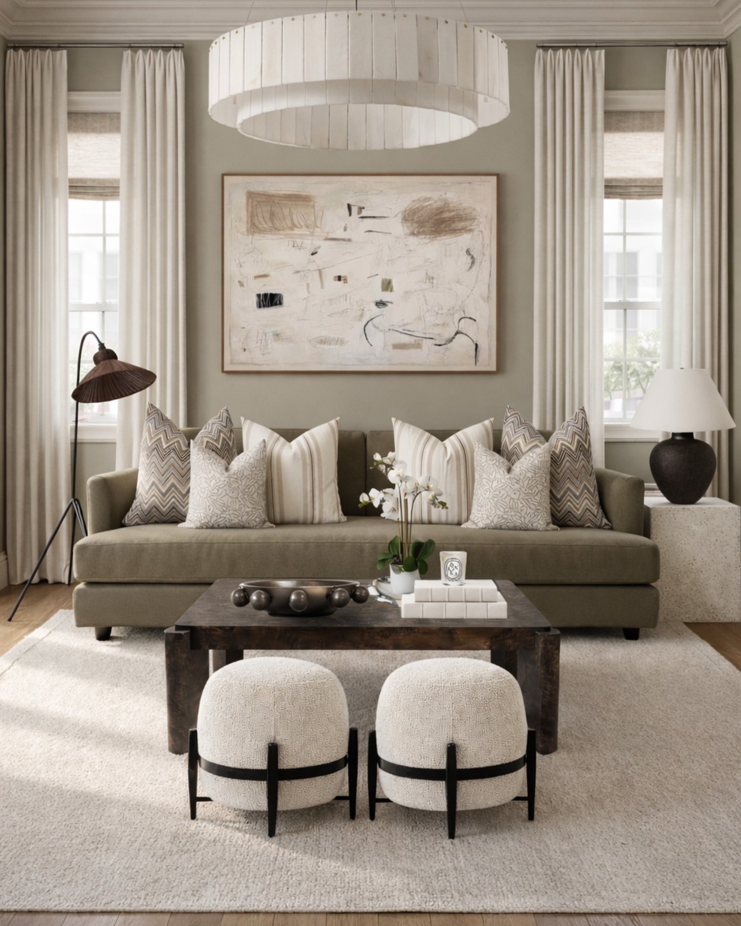 This is how you make a neutral space feel layered&mdash;not flat.

Nothing here is overly bold, but the mix of tones, textures, and subtle contrast is doing all the work. The warm wood, soft upholstery, and tonal pillows keep everything cohesive whil