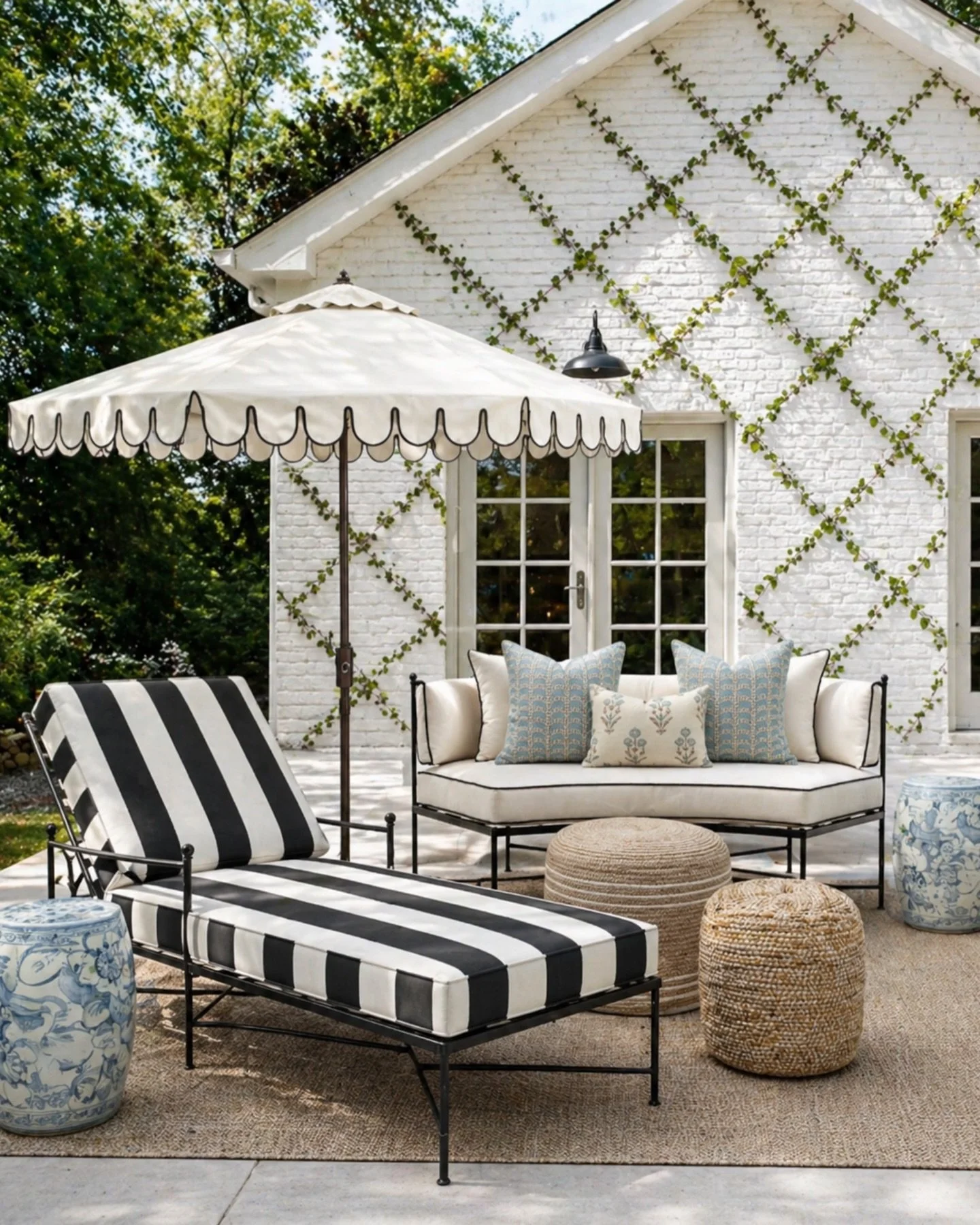 An easy outdoor setup that looks put together without overthinking it.

A striped lounge chair to make it feel styled
A neutral sofa that goes with everything
A few blue accents for color
Woven pieces to keep it warm and relaxed

Simple, clean, and a