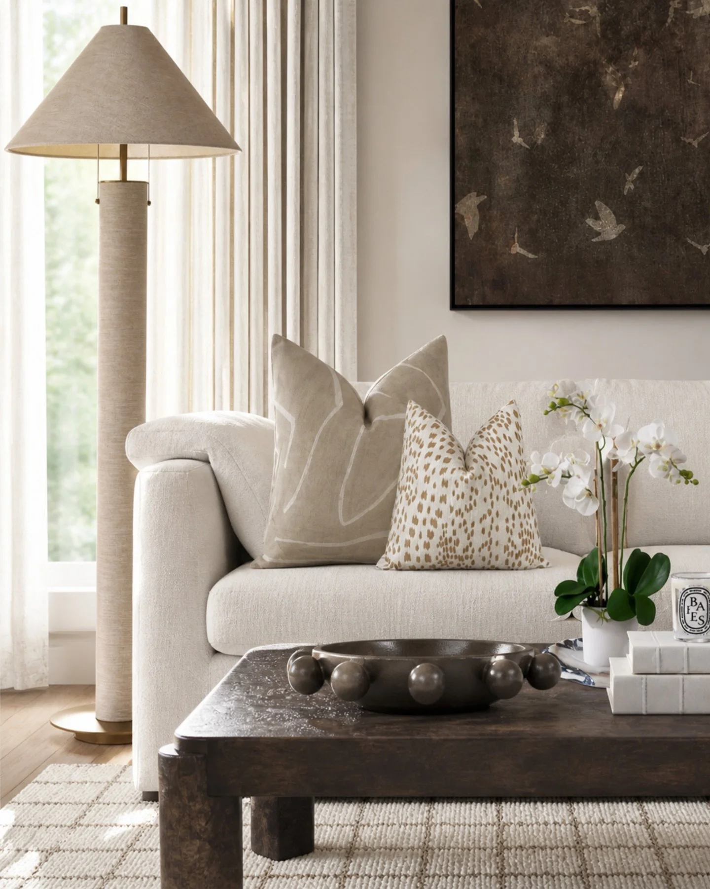 Soft neutrals, layered textures, and just the right amount of contrast 🤎
This living room look is all about creating a calm, elevated space with pieces that feel timeless and collected &mdash; from the linen-wrapped floor lamp and cozy pillows to th