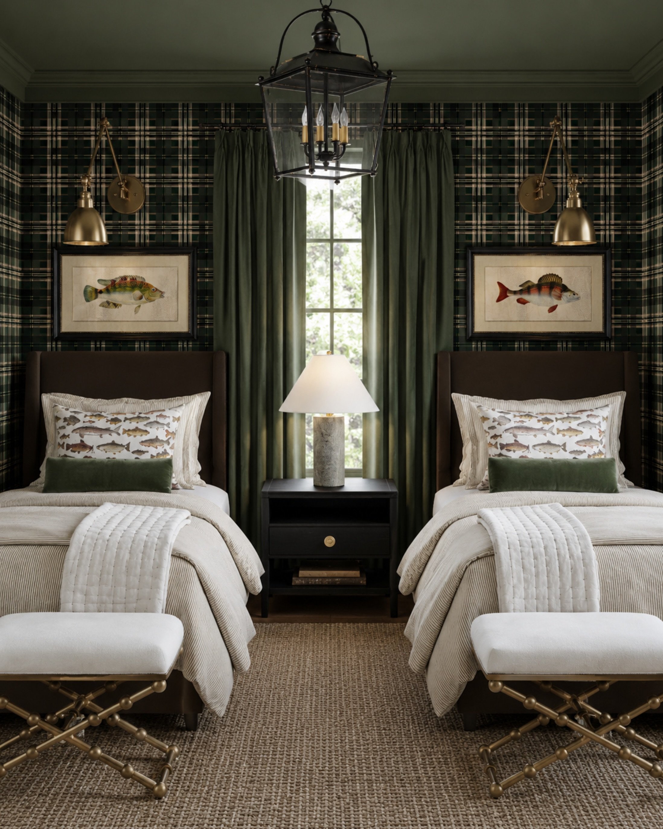 This bedroom is the perfect example of how to do the moody lake house look without making it feel overly themed. ✨

The plaid wallpaper, rich green accents, brass sconces, and tailored bedding give the room that cozy, elevated feel that instantly mak
