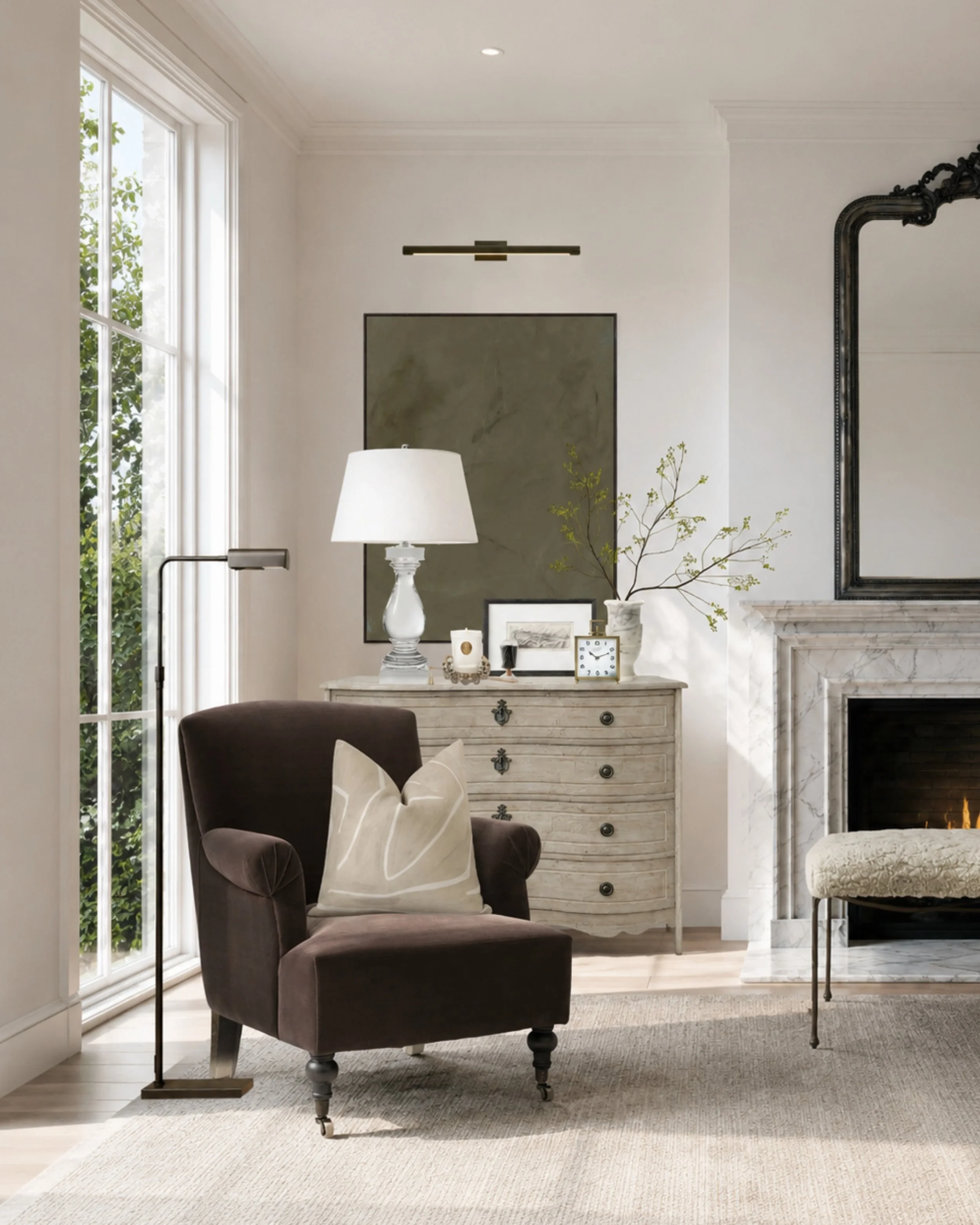 Neutral, layered, and quietly elegant 🤎

This room is all about the mix: a classic marble fireplace, antique-inspired wood tones, soft linen textures, aged brass lighting, and a cozy chocolate brown accent chair. The perfect balance of refined and i