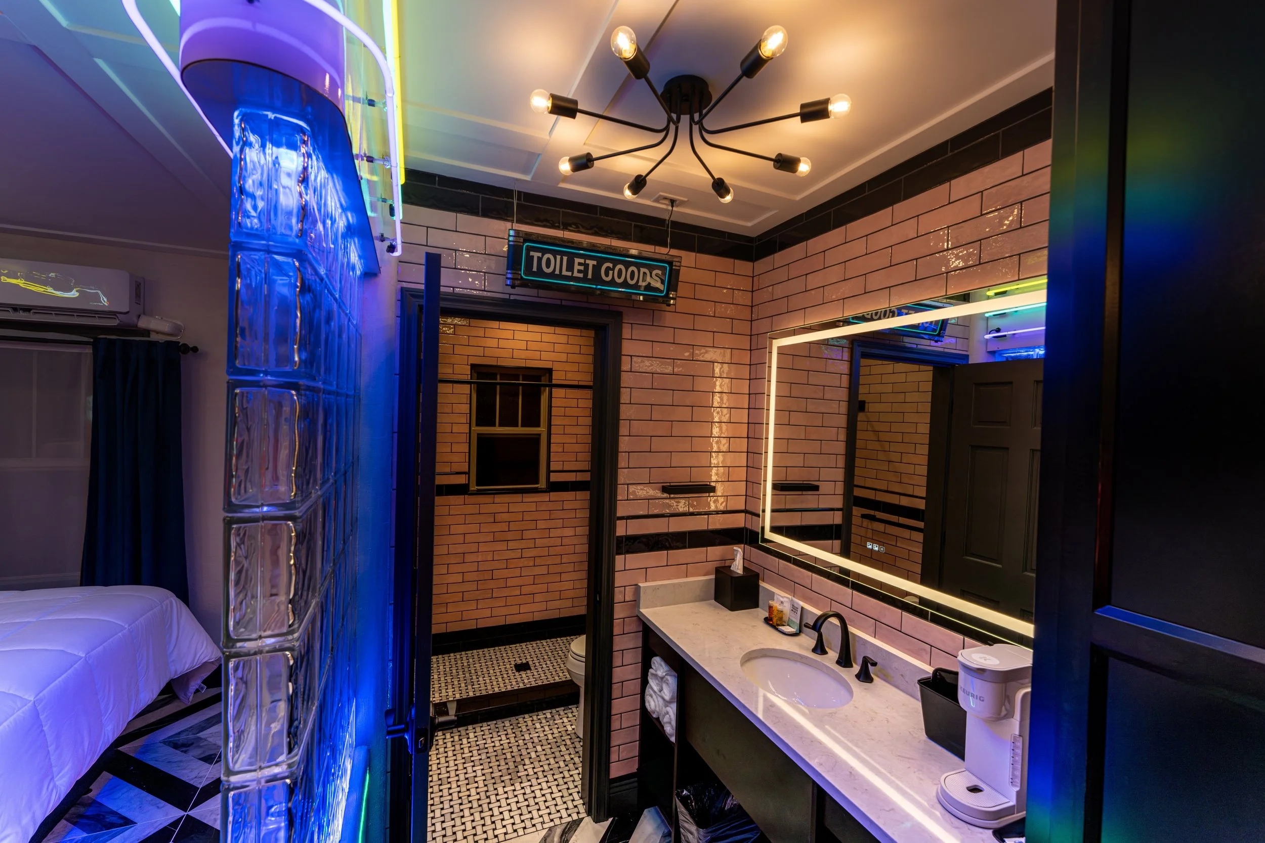 Glass-block wall and vanity area in the Neon Room.